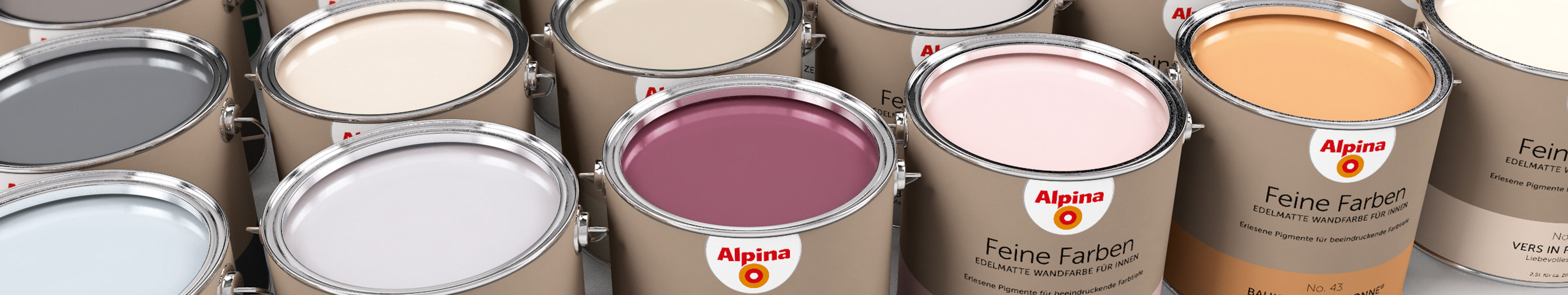 Mehrere Reihen von Gebinden mit Wandfarben in unterschiedlichen Farbtönen aus der Alpina Feine Farben Kollektion.