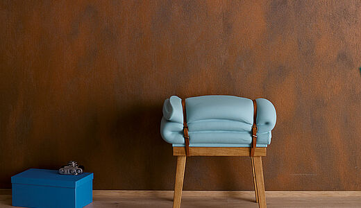 Rostoptik-Wandfarbe für edel gealtert wirkende Wände – mit Streichanleitung